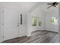 Bright entryway with new hardwood flooring and a bay window for ample natural light at 4320 Snowbird Ave, Broomfield, CO 80020