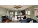 Inviting living space with dining area and abundant natural light at 2034 S Lincoln St, Denver, CO 80210