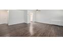Inviting living area with hardwood floors and ample natural light at 888 N Logan St # 2E, Denver, CO 80203
