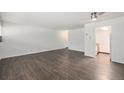 Spacious living room with hardwood floors ready to customize at 888 N Logan St # 2E, Denver, CO 80203