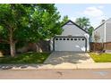 Spacious two car garage with ample parking and attractive landscaping at 9654 W Elmhurst Pl, Littleton, CO 80128