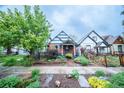 Charming home featuring a landscaped front yard with stone pathway at 4467 W 30Th Ave, Denver, CO 80212
