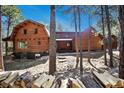 Spacious log home with lots of wood and nice landscaping at 17940 Smugglers Rd, Monument, CO 80132