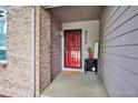 Inviting entryway featuring a security door and decorative accents, creating a warm welcome at 9036 W Wisconsin Ave, Lakewood, CO 80232
