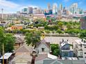 Scenic view of the city skyline from a charming house in an urban neighborhood at 2021 Eliot St, Denver, CO 80211