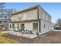 Contemporary two-story home boasts a modern design with a spacious patio at 4795 Highline Pl, Denver, CO 80222