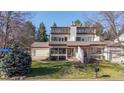 Charming two-story home with lush landscaping, and attached two-car garage at 2715 Northbrook Pl, Boulder, CO 80304