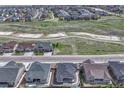 Aerial view of a Gathering friendly community showcasing a home's location near open space and other residential properties at 7646 Greenwater Cir, Castle Rock, CO 80108