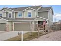 Charming home featuring a two-car garage and craftsman details at 5671 Raleigh Cir, Castle Rock, CO 80104