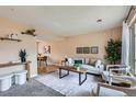 Inviting living room showcases stylish decor, comfortable seating, and an open layout at 431 S Balsam St, Lakewood, CO 80226