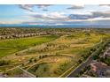 Expansive aerial shot capturing trails and green spaces within a vibrant community near the mountains and cityscape at 8336 E 35Th Ave, Denver, CO 80238