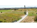 Scenic park view highlighting the walking path and recreational spaces, perfect for outdoor activities and community engagement at 8336 E 35Th Ave, Denver, CO 80238