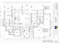 Detailed main floor plan showcasing open living spaces, bedrooms, and four car garage at 1561 Arrowpoint Ct, Franktown, CO 80116