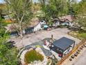Backyard oasis includes pond, fire pit, and patio area at 1051 Independence St, Lakewood, CO 80215