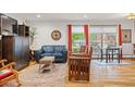 Inviting living room with natural light, hardwood floors, and stylish decor at 1200 N Humboldt St # 101, Denver, CO 80218