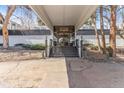 Inviting entryway features steps and covered entrance of the building at 2375 S Linden Ct # 118, Denver, CO 80222