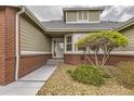 Attractive front entrance with landscaping and walkway to the front door at 7851 S Quatar Ct, Aurora, CO 80016