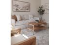 Stylish living room with comfortable seating, neutral tones, and a chic coffee table decor at 2301 E Fremont Ave # W03, Centennial, CO 80122