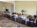 Inviting dining room with decorative rug and wood dining table at 75 Pierce St, Lakewood, CO 80226