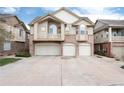 Charming two-story townhouse featuring a private balcony and attached two-car garage at 341 Granby Way # A, Aurora, CO 80011