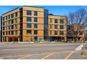 Apartment building featuring modern architecture and attractive landscaping, perfect for upscale urban living at 1601 Park Ave # 202, Denver, CO 80218
