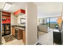 Efficient kitchen featuring granite countertops, stainless steel appliances, and ample cabinet space at 1020 15Th St # 16A, Denver, CO 80202