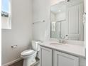 Bright bathroom with white vanity, modern fixtures, and a glass-enclosed shower, providing a clean and functional design at 9151 Telluride Ct, Commerce City, CO 80022