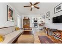 Inviting living room with hardwood floors, eclectic decor, and a seamless flow into the kitchen at 2024 Ford St, Golden, CO 80401