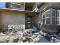 Inviting home entrance with a seating area and stylish front door at 10732 W Florida Ave # B, Lakewood, CO 80232