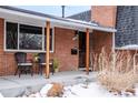 Inviting front porch with cozy seating and decorative features at 10902 Bannock St, Northglenn, CO 80234