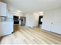 Modern kitchen with stainless steel appliances and plenty of cabinet space at 4623 S Lowell Blvd, Denver, CO 80236