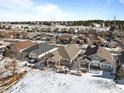 Community overview showing homes and a snow covered golf course at 8171 S Catawba Ct, Aurora, CO 80016
