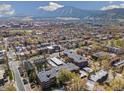 Breathtaking aerial view showcases Boulder's cityscape and the majestic Flatirons mountains in the background at 2227 Canyon Blvd # 162B, Boulder, CO 80302
