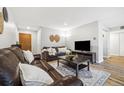 Comfortable living room with neutral tones, stylish decor, a large television, and ample seating at 2227 Canyon Blvd # 162B, Boulder, CO 80302