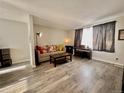 Comfortable living room with couch and side table at 9852 W 76Th Ave, Arvada, CO 80005