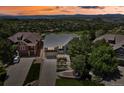 Stunning aerial view of a home with a beautiful landscape and mountain views in a desirable neighborhood at 1975 Wild Star Way, Castle Rock, CO 80104