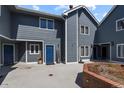 The exterior showcases modern siding and inviting entrances at 1320 S Monaco St Pkwy # 3, Denver, CO 80224