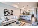 Inviting living space showcasing open layout, eat-in kitchen, modern furniture, and contemporary design at 1919 W 46Th Ave # 3, Denver, CO 80211