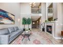 Inviting lobby area with fireplace, artwork, and elegant decor at 111 S Monroe St # B203, Denver, CO 80209