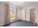 Charming bedroom with hardwood floors and large window at 2219 W 33Rd Ave, Denver, CO 80211