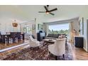 Inviting living room with large windows, natural light and mountain views at 18680 Knollwood Blvd, Monument, CO 80132
