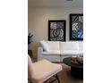 Contemporary living room showcasing modern decor, a comfortable couch, and striking wall art at 1815 N Williams St, Denver, CO 80218
