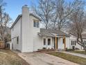 Charming exterior view of home featuring a well-manicured lawn at 2310 Willow Creek Dr, Golden, CO 80401