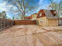 Property features a detached two-car garage and a spacious private drive at 240 Colorado Blvd, Denver, CO 80206