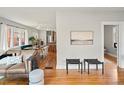 Inviting living space featuring hardwood floors, comfortable seating, and bright, airy design at 361 S Logan St, Denver, CO 80209
