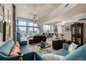 Spacious living room showcasing open layout, with large windows, and modern decor at 1700 Bassett St # 513, Denver, CO 80202