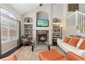 Bright living room with a fireplace and large windows at 2253 Imperial Ln, Superior, CO 80027