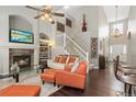 Spacious living room with hardwood floors and a fireplace at 2253 Imperial Ln, Superior, CO 80027