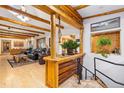 Inviting living room with exposed wood beams and bar area at 150 Hess Ave, Golden, CO 80401