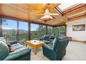 Bright sun room with skylights, wood ceiling and amazing mountain views at 150 Hess Ave, Golden, CO 80401